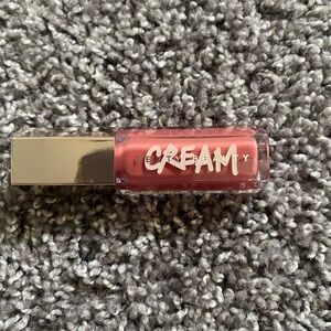 Fenty beauty lip gloss in shade in fenty glow